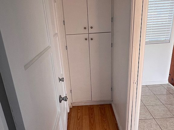 Hall way to restroom, Kitchen and bedroom