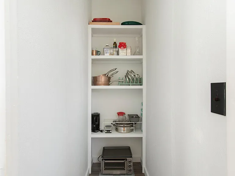 Pantry provides extra space and storage.