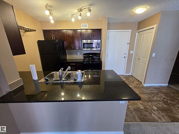 5th image of 5816 Mullen Pl NW #319