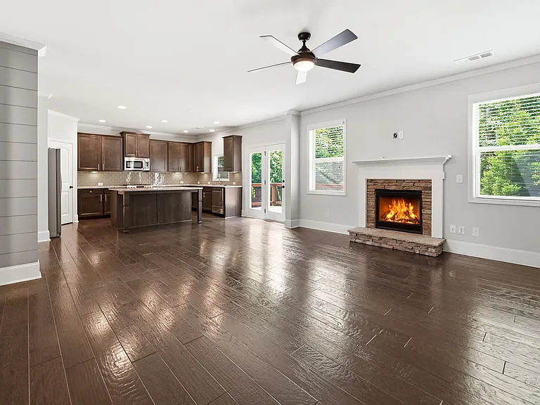 Family room accented with gas log fireplace
