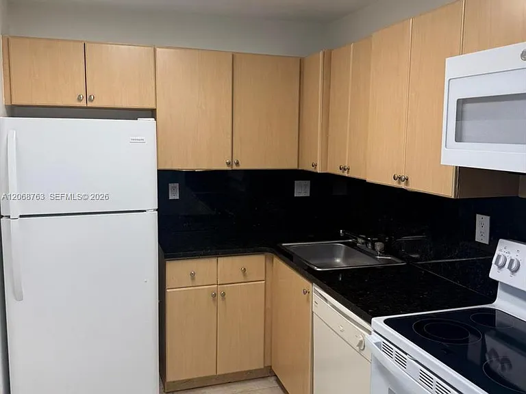 7110 NW 179th St #310 — Photo 3