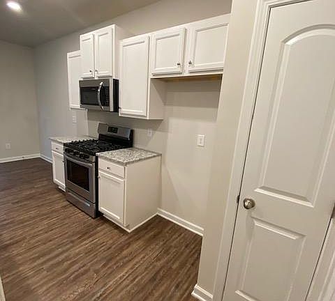 Kitchen as a stove, oven and refridgerator (not shown, picture taken prior to New Refrigerator was delivdered)