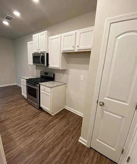 Kitchen as a stove, oven and refridgerator (not shown, picture taken prior to New Refrigerator was delivdered)