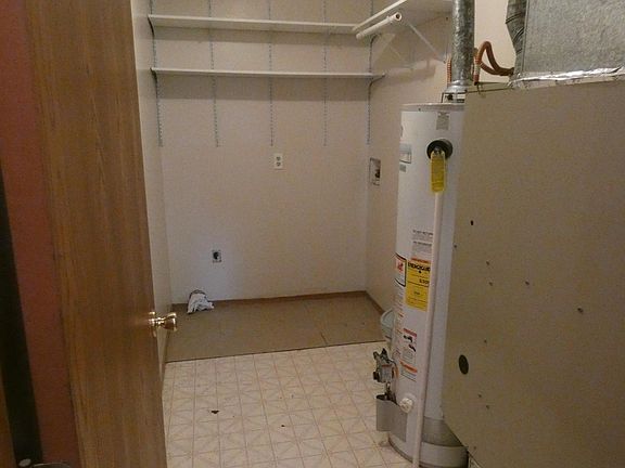 Washer / dryer hook up & storage room