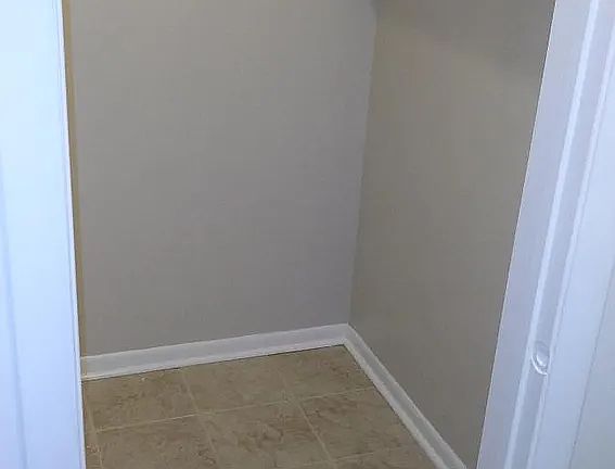 Walk-in closet off of master bedroom.