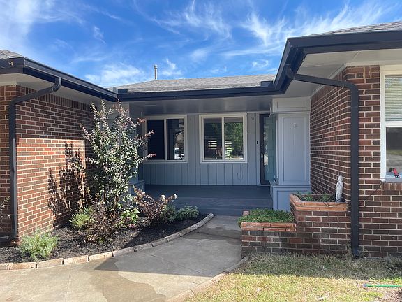New Windows, large covered front porch