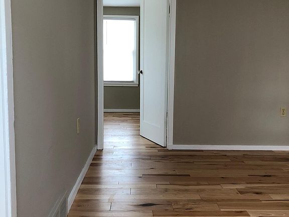 Living room wall #1, looking into bedroom