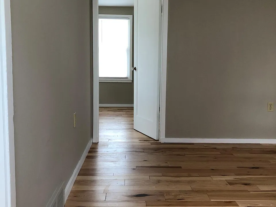 Living room wall #1, looking into bedroom