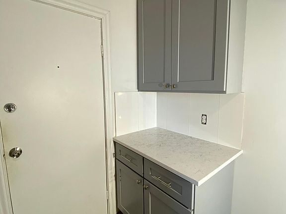 Kitchen and Front Door to the apartment