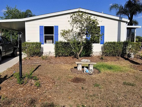 front with extra long driveway