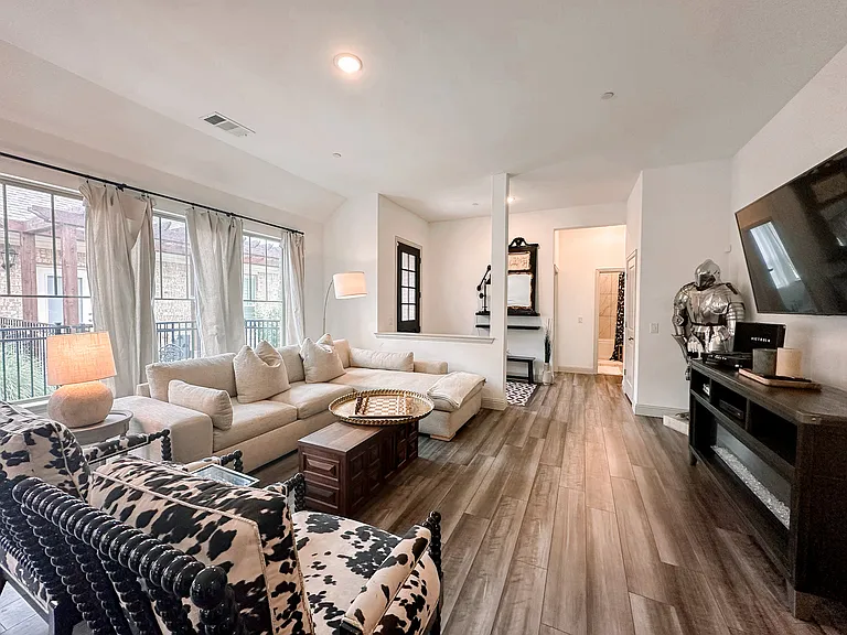 Open floorplan with tons of natural light with the wall of windows