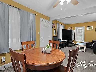 Living and Dinning Room
Entry To Sunroom in front of house