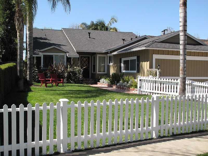 Larger Front Yard with White Picket Fence
