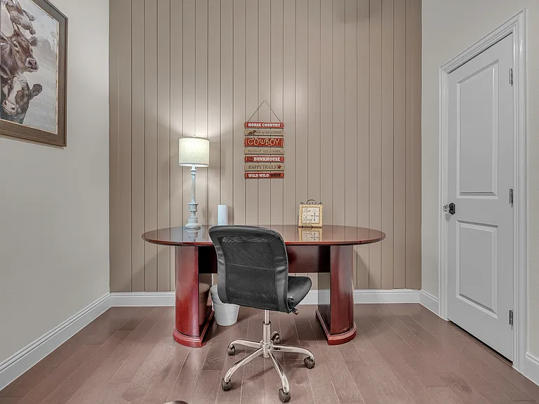 4th flex room is set up as an executive office with closet, ceiling fan, sitting area (not in picture), can also be a 4th bedroom with twin bed or baby bed room.