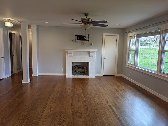 Living room with decorative fireplace (fireplace is for decoration only).