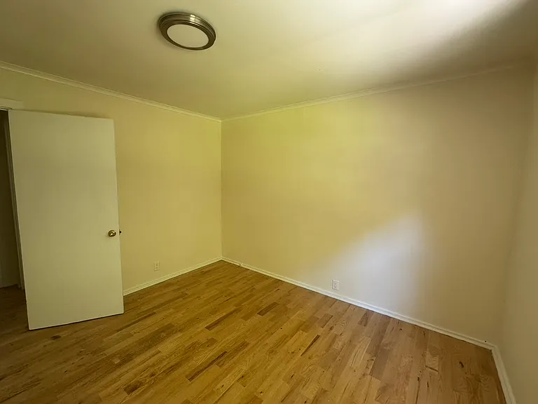 Upstairs front bedroom.