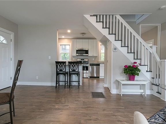 Living room/dining room with brand new hardwood floors