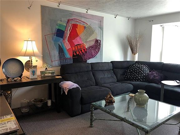 Large livingroom-sectional and coffee table included!