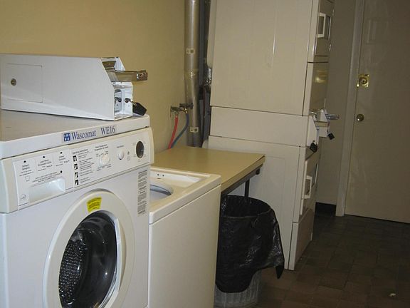 LAUNDRY FACILITY IN BASEMENT