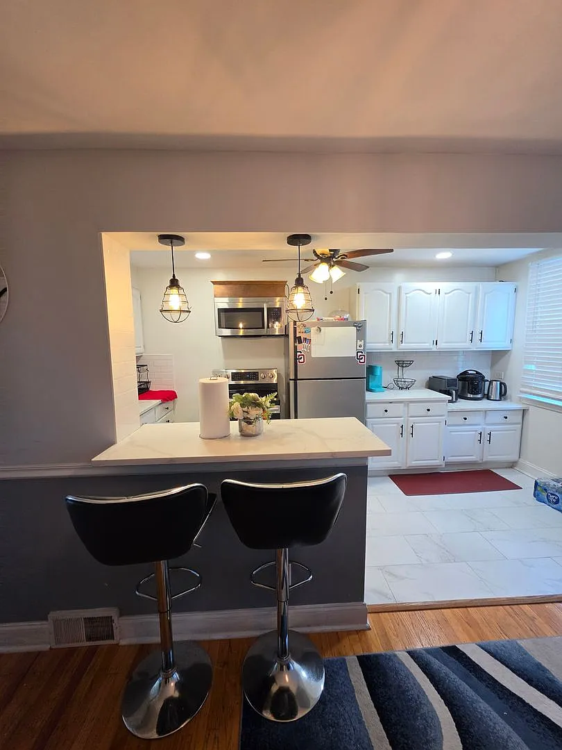 Spacious 3-Bedroom, 2-Bath Home with Finished Basement, Parking & Central Air — Photo 3