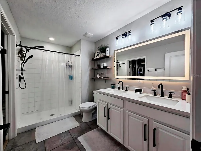 10005 Rose Petal Pl — Photo 22