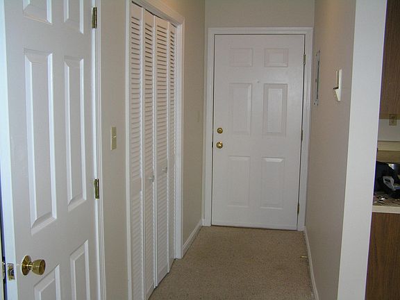 Front Hall, utility room door, and entry closet