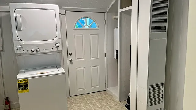 New stackable washer/dryer. New on-demand gas hot-water heater.