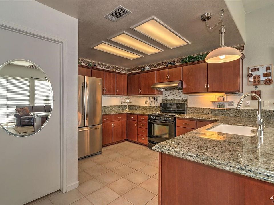 Remodeled Kitchen with Granite counters and newer appliances.