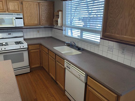 Spacious Island Kitchen with Corian countertops