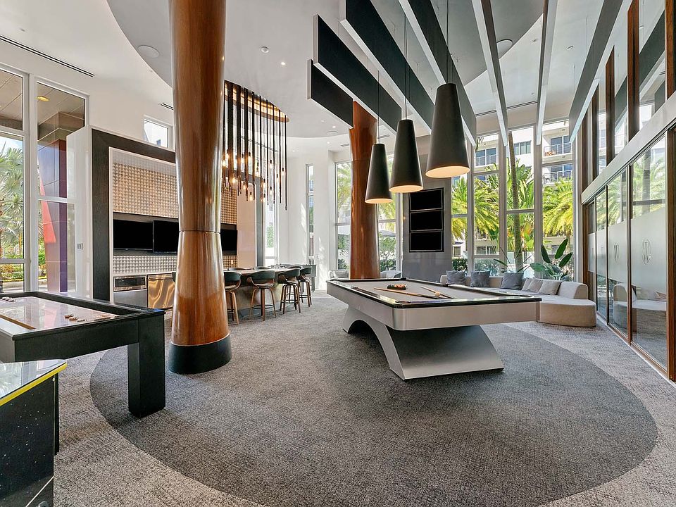 Break, play, and unwind around a modern billiards table that brings energy and friendly rivalry to the heart of the lounge