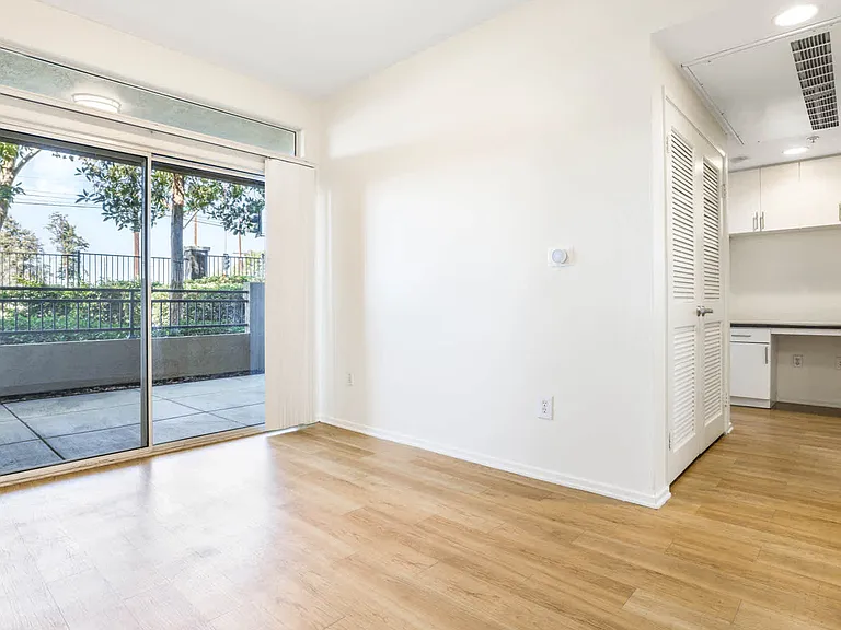 Living Room with Patio and Hard Surface Flooring