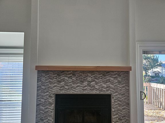 Remodeled fireplace and mantle.