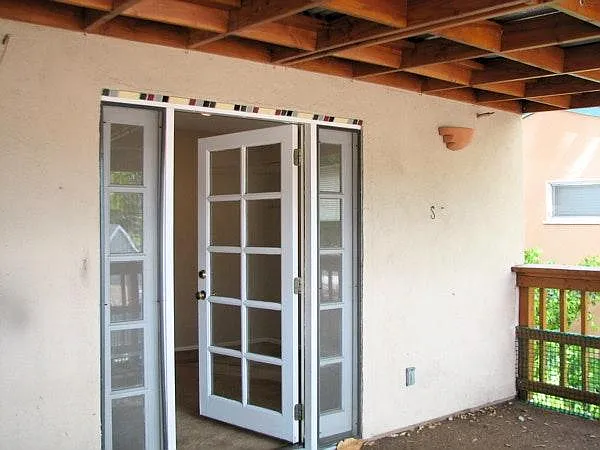 Bedroom French-Door leading to Covered Balcony