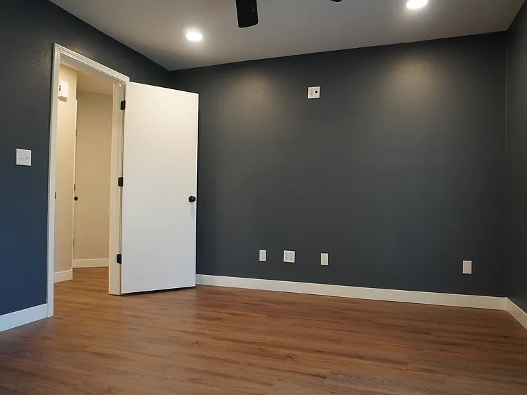 Bright and inviting Second Bedroom, offering ample space and a cozy atmosphere for comfort and rest.