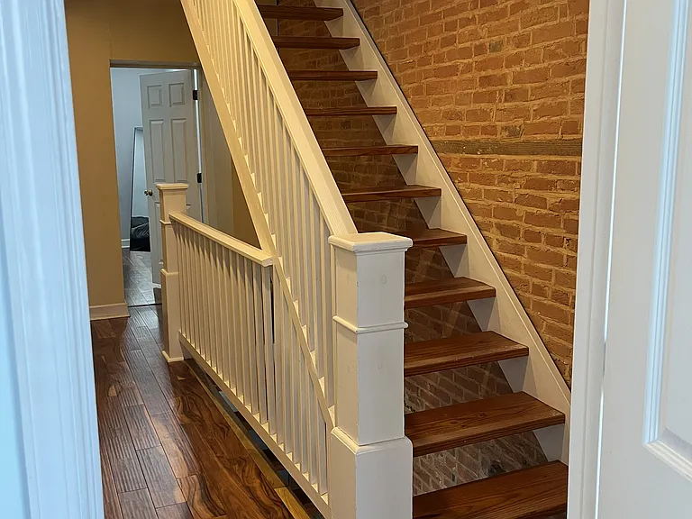 Second floor steps up to third floor