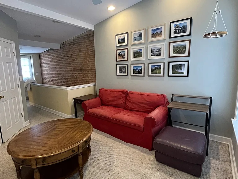 Third floor bedroom with walk-in closet, open area previously used as entertainment area
