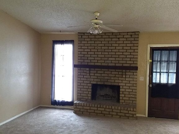From entryway proceeding into living room.