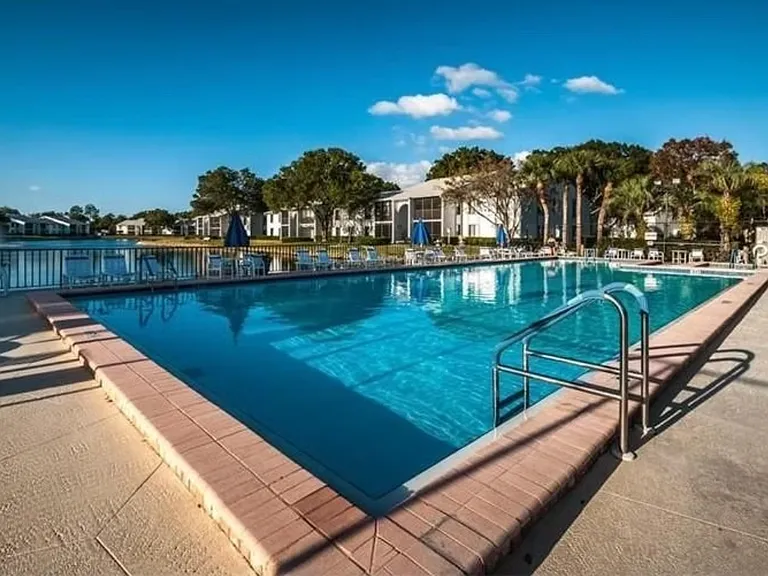 Large heated pool and large hot tub at clubhouse