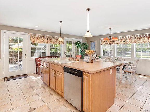 Eat-in Kitchen with door leading to back patio