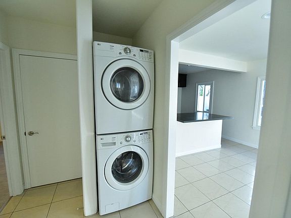 Frontload washer and dryer included.