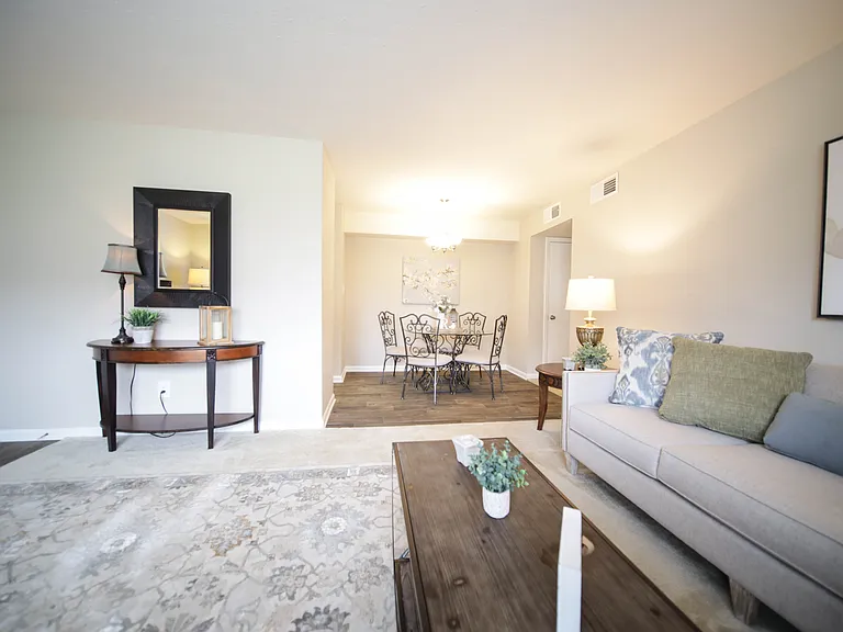 Spacious, landscaped outdoor terrace with lush seating, grills and a fire pit