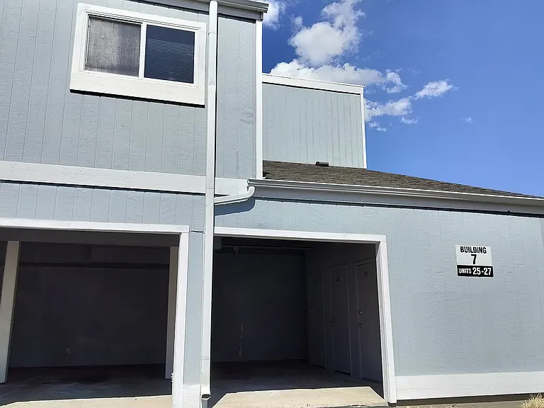 Two dedicated parking spaces attached to building