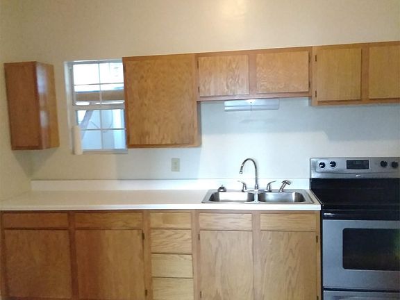 Kitchen has more space for a breakfast cart or bakers rack