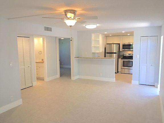 LR & Dining Area with Breakfast Bar (similar apartment same building)