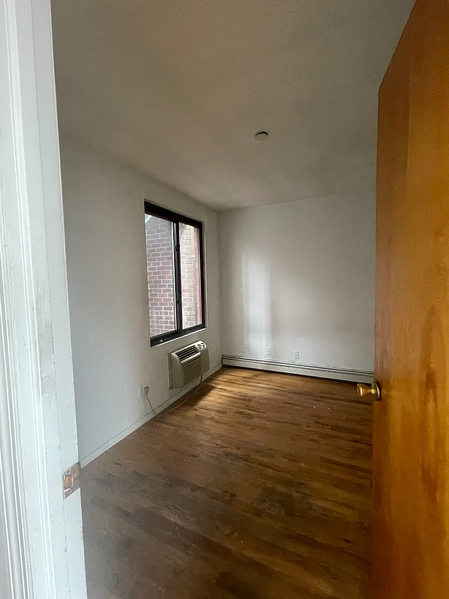Building Photo - 407 W 51st St #A
