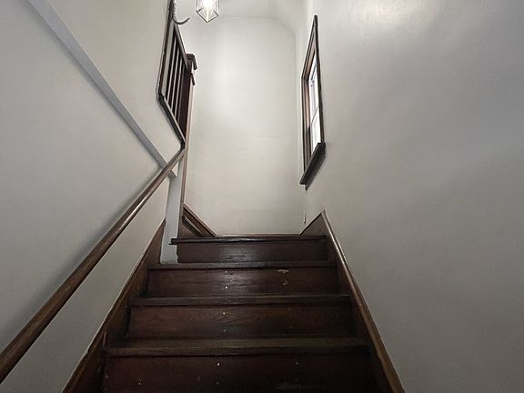 Stairs to the second floor apartment
