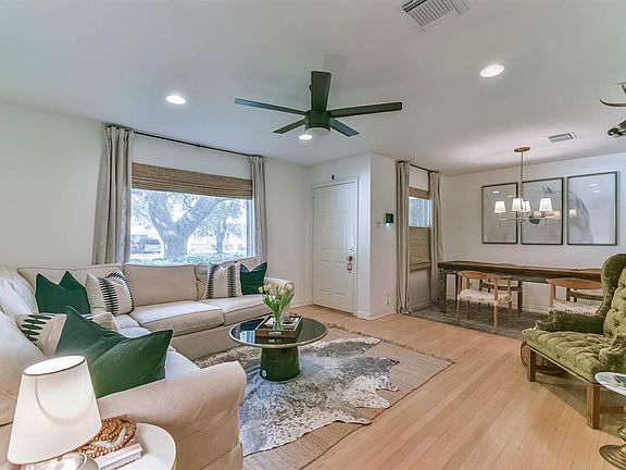 Living room opens up to the dining area.