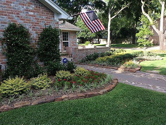 Recently landscaped with lush, native plants that are low-maintenance.