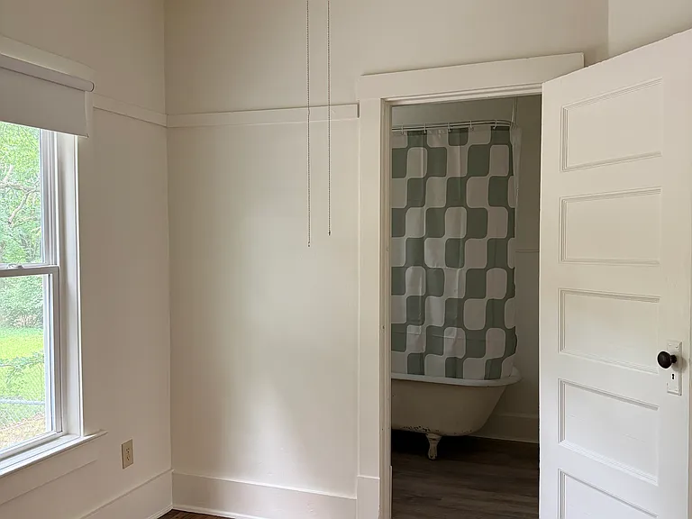 bathroom door from bedroom 2