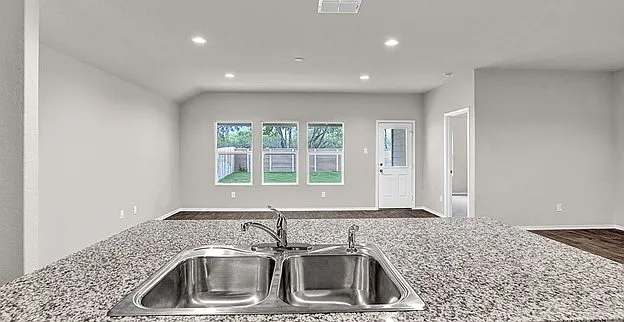 Open Kitchen and Living Room overlooking the backyard
